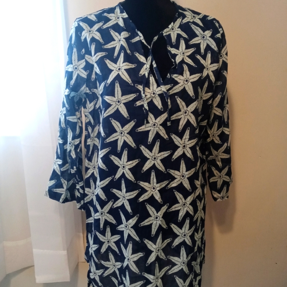 Blue and white tunic length blouse